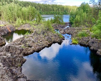 Водопады, дегустация минеральной воды, подъём на гору Сампо