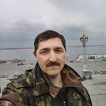 Николай